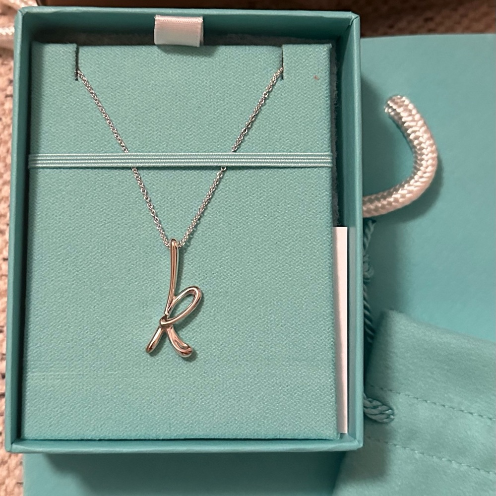 NWT Tiffany “k” pendant on 16” sterling silver chain.
